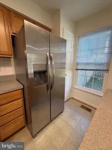 a kitchen that has a sink and a stove