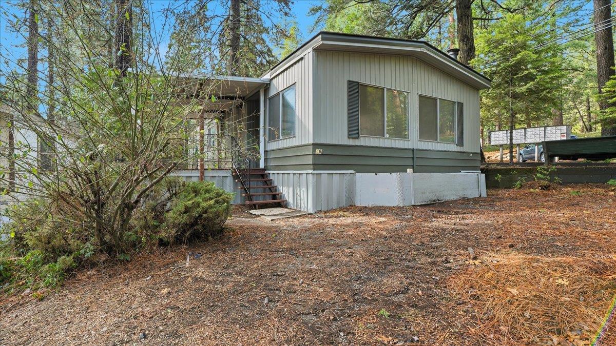 5840 Pony Express Trail, Unit 46 Pollock Pines, CA 95726 - Photo 1 of 22 a view of a house with a yard