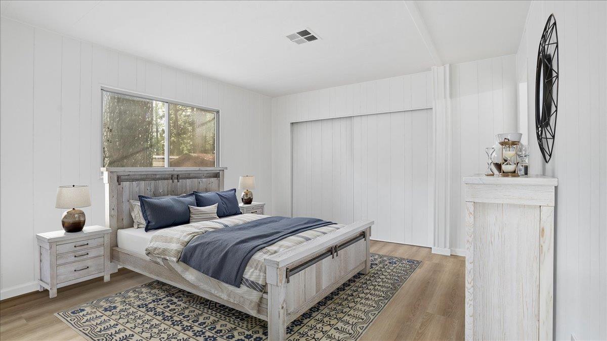 5840 Pony Express Trail, Unit 46 Pollock Pines, CA 95726 - Photo 13 of 22 a bedroom with double bed and a window