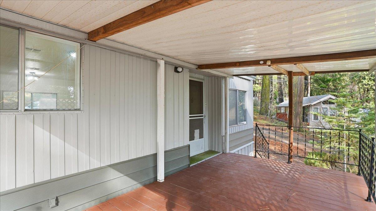 5840 Pony Express Trail, Unit 46 Pollock Pines, CA 95726 - Photo 3 of 22 a big room with wooden floor and windows