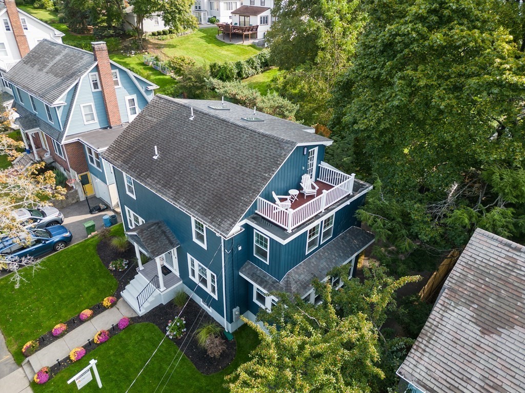 8 Lovell Road Watertown, MA 02472 - Photo 4 of 42 an aerial view of a house with a yard