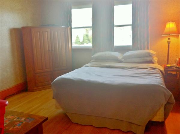 231 Lepes Road Somerset, MA 02726 - Photo 11 of 19 a large bed sitting in a bedroom next to a window