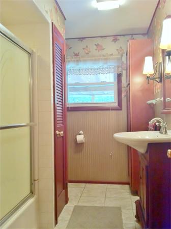 231 Lepes Road Somerset, MA 02726 - Photo 13 of 19 a bathroom with a sink and a mirror