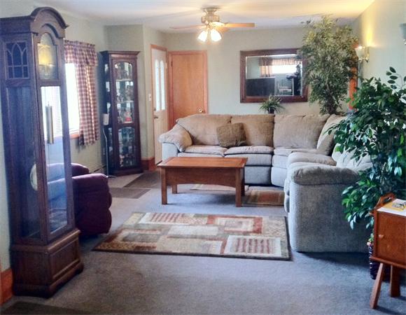 231 Lepes Road Somerset, MA 02726 - Photo 6 of 19 a living room with furniture and a potted plant