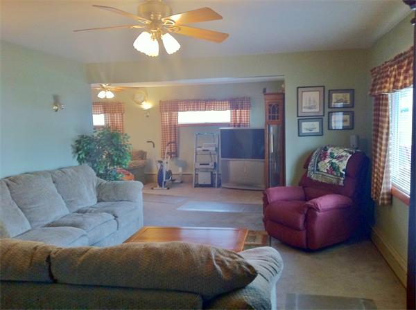 231 Lepes Road Somerset, MA 02726 - Photo 7 of 19 a living room with furniture and a large mirror