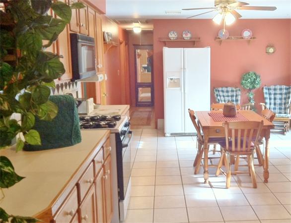 231 Lepes Road Somerset, MA 02726 - Photo 9 of 19 a view of a dining room with furniture and chandelier