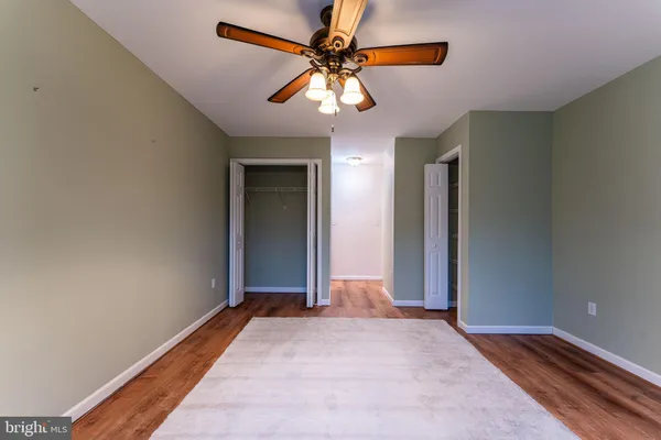a view of livingroom with window and ceiling fan