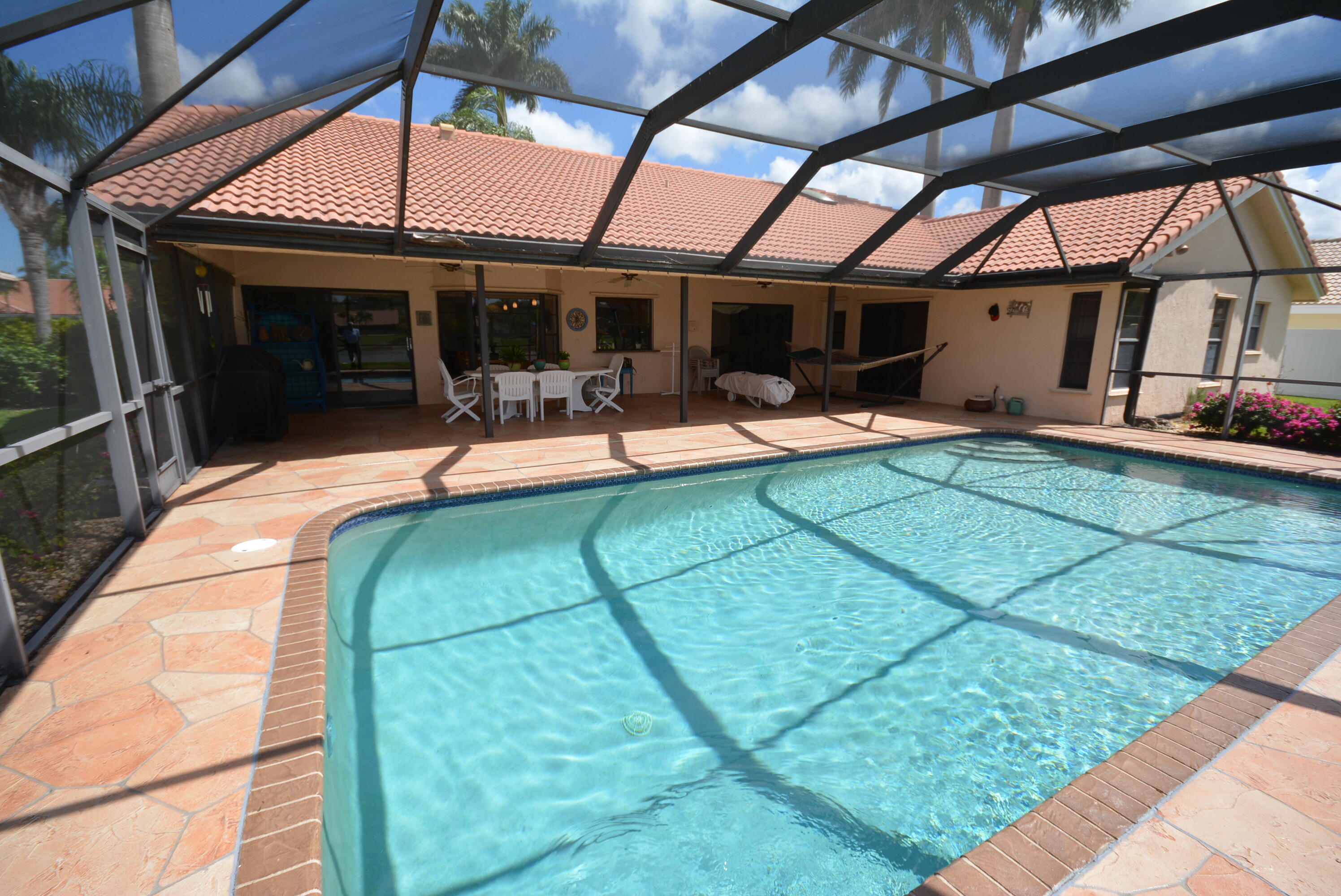 11330 Lake Tree Court Boca Raton, FL 33498 - Photo 7 of 33 Screened Patio & Pool with Lakeviews