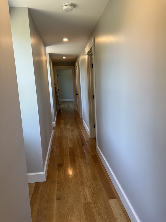 138 High Street Hingham, MA 02043 - Photo 11 of 23 a view of hallway with wooden floor