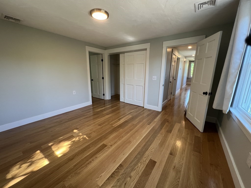 138 High Street Hingham, MA 02043 - Photo 14 of 23 a view of empty room with wooden floor