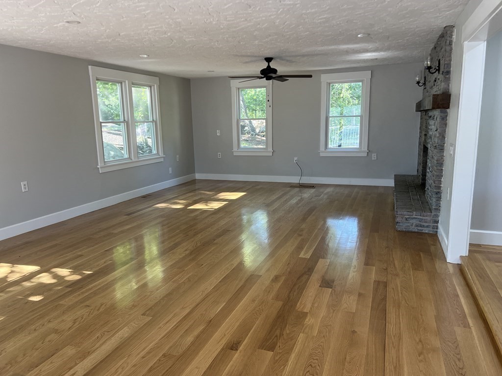 138 High Street Hingham, MA 02043 - Photo 9 of 23 a view of empty room with wooden floor and fan