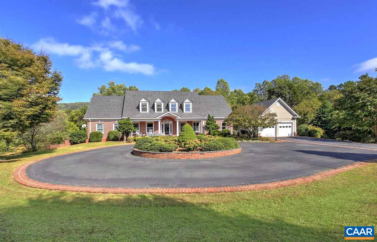 2490 Ranson Court Charlottesville, VA 22911 - Photo 1 of 39 a front view of a house with a garden and yard