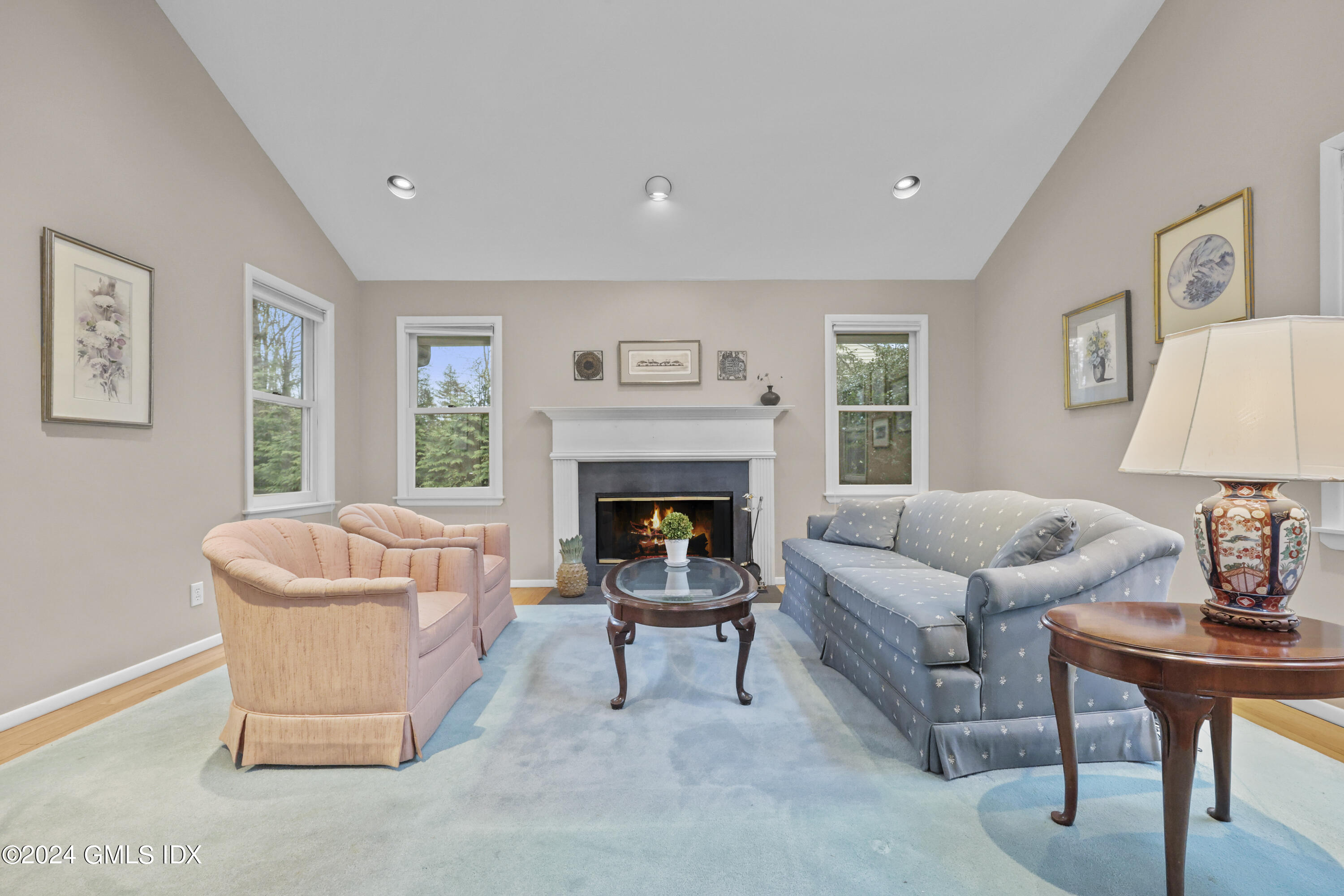 28 Dandy Drive Cos Cob, CT 06807 - Photo 2 of 24 a living room with furniture and a fireplace