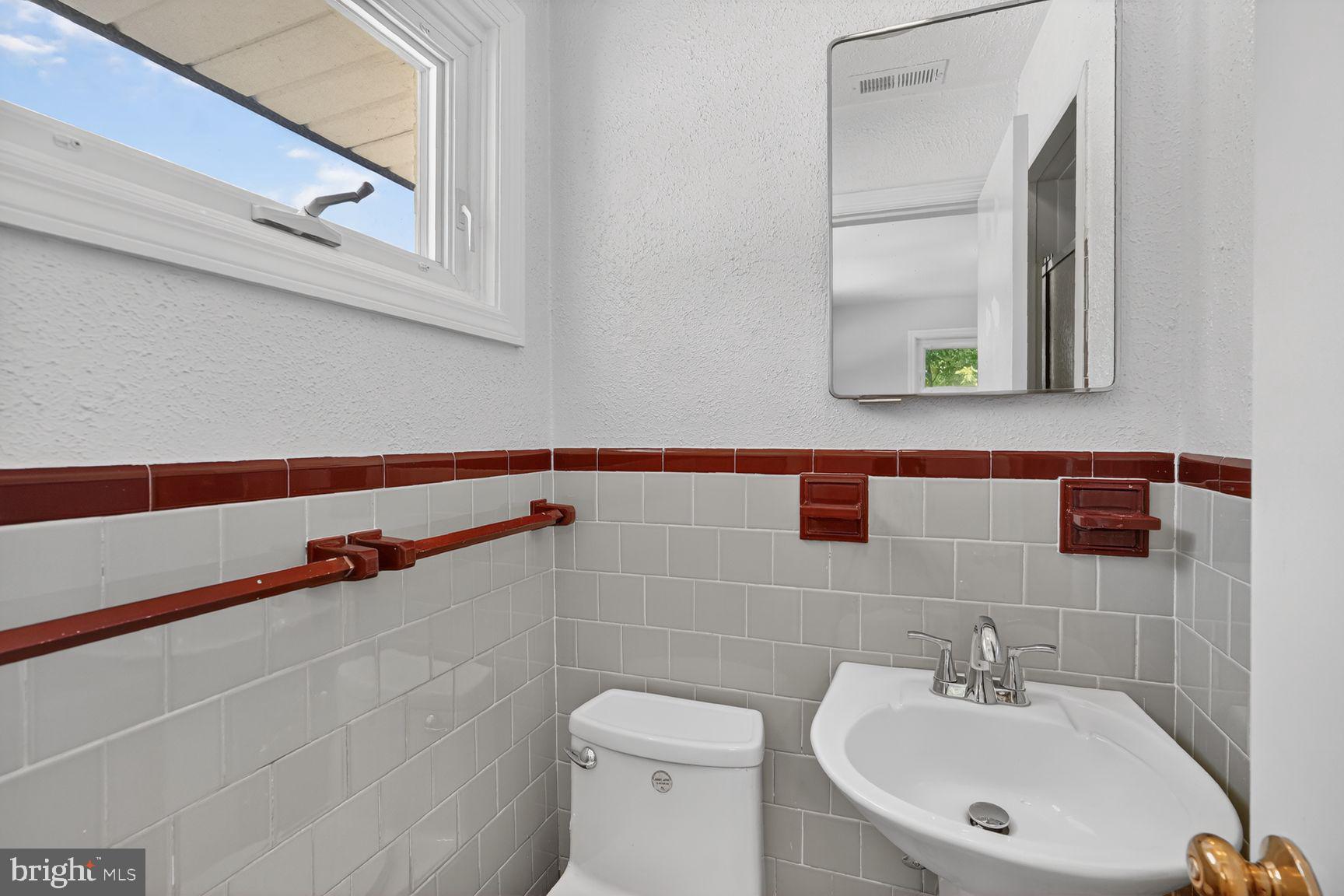 4202 Yates Road Beltsville, MD 20705 - Photo 17 of 31 Charming bathroom with modern accents.