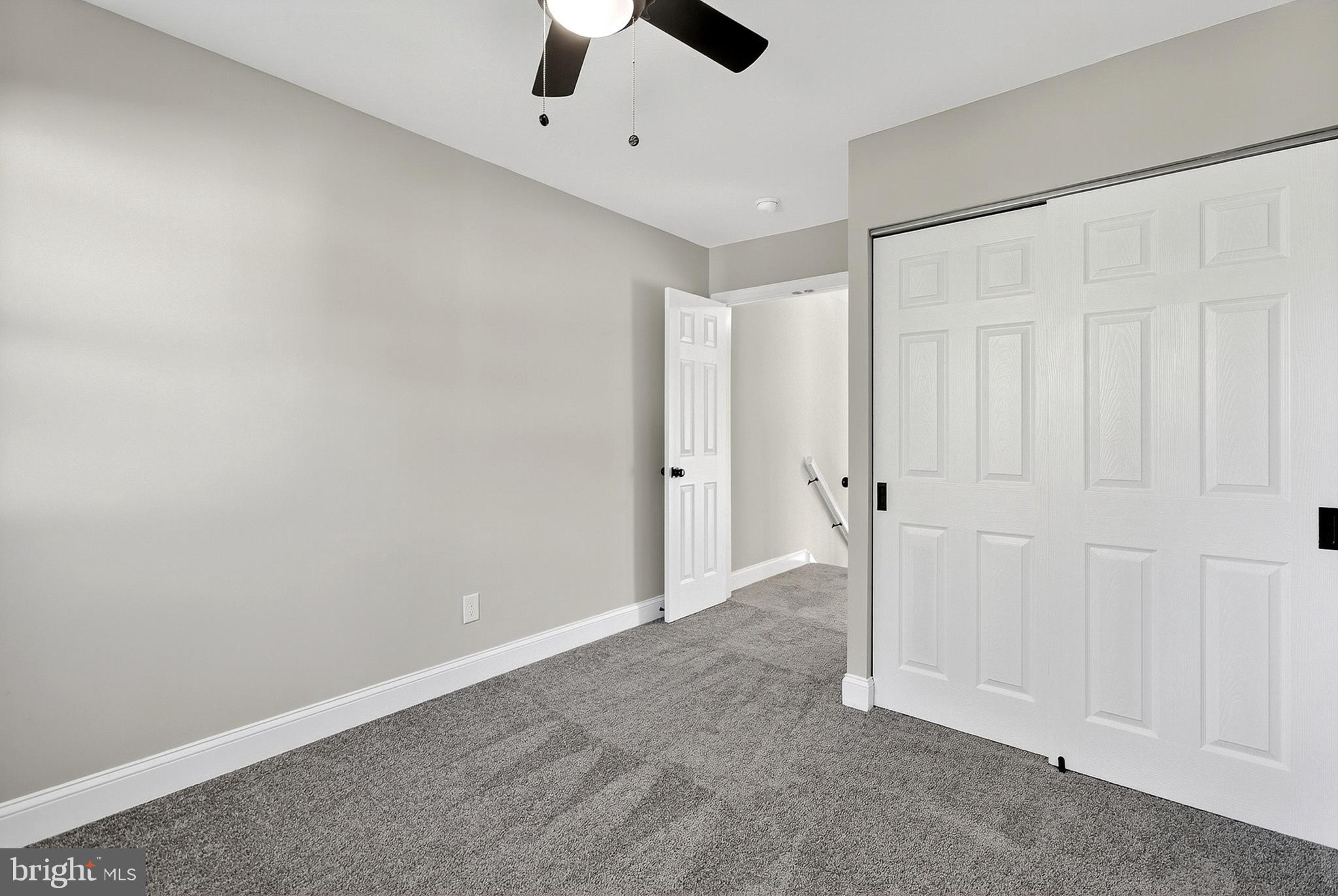 4 Corvas Court Sewell, NJ 08080 - Photo 24 of 40 an empty room with chandelier fan