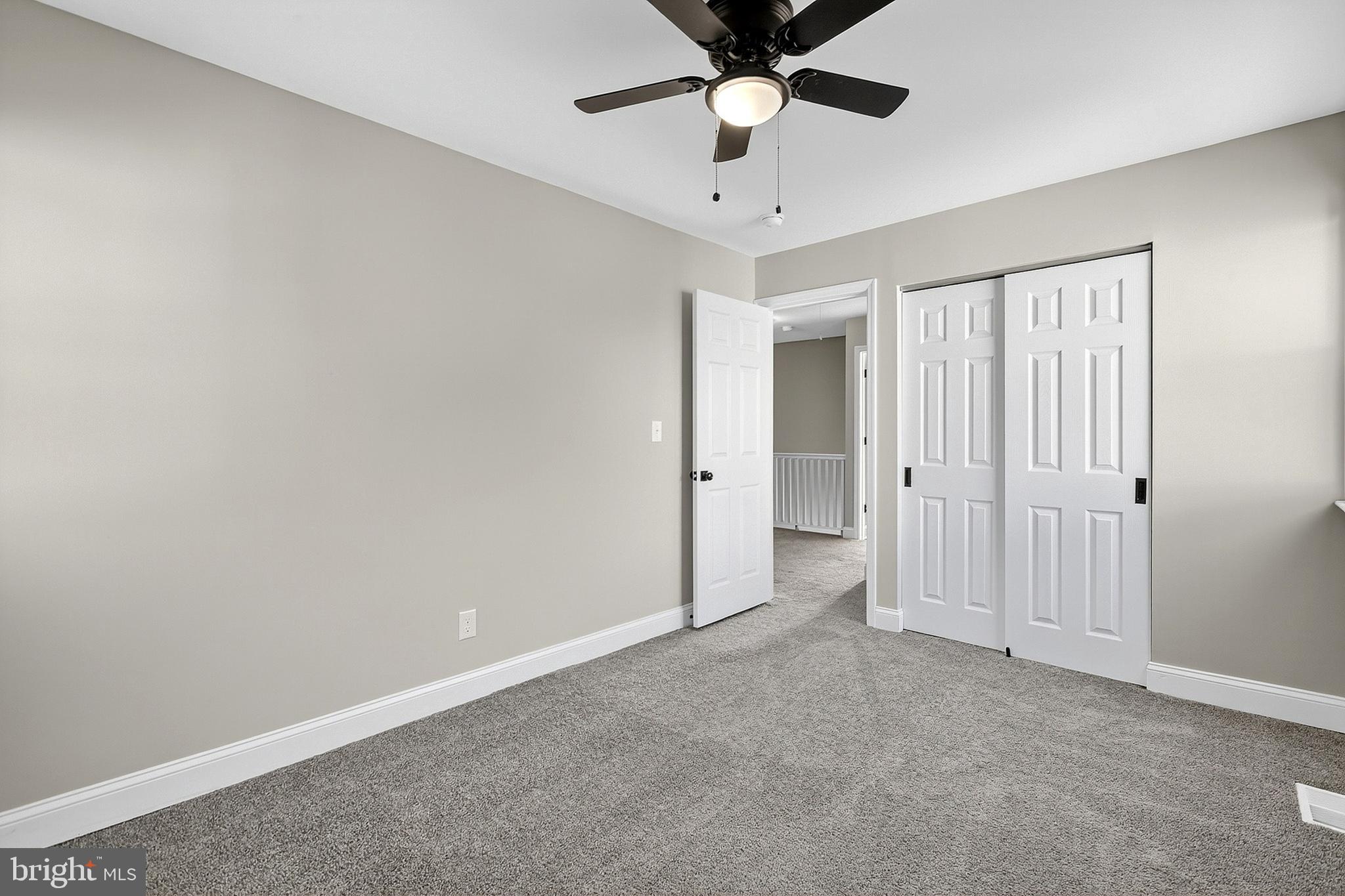 4 Corvas Court Sewell, NJ 08080 - Photo 27 of 40 an empty room with a empty space and a ceiling fan