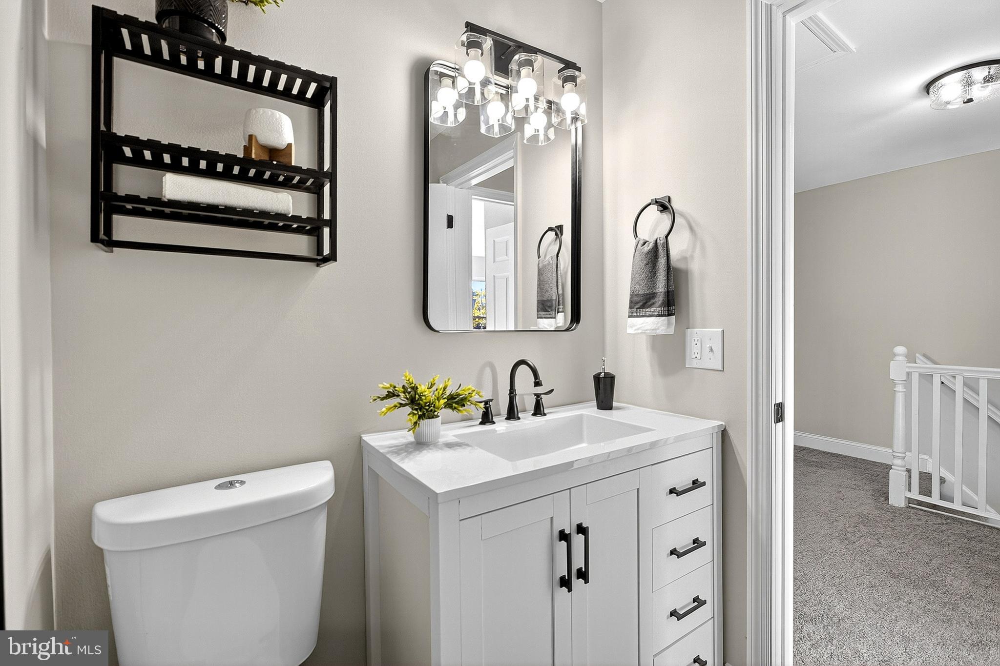 4 Corvas Court Sewell, NJ 08080 - Photo 29 of 40 a bathroom with a sink a mirror and a toilet