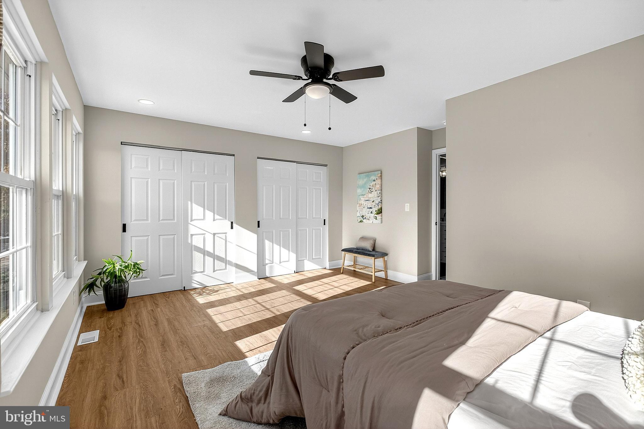 4 Corvas Court Sewell, NJ 08080 - Photo 35 of 40 a bedroom with a bed chandelier and a window