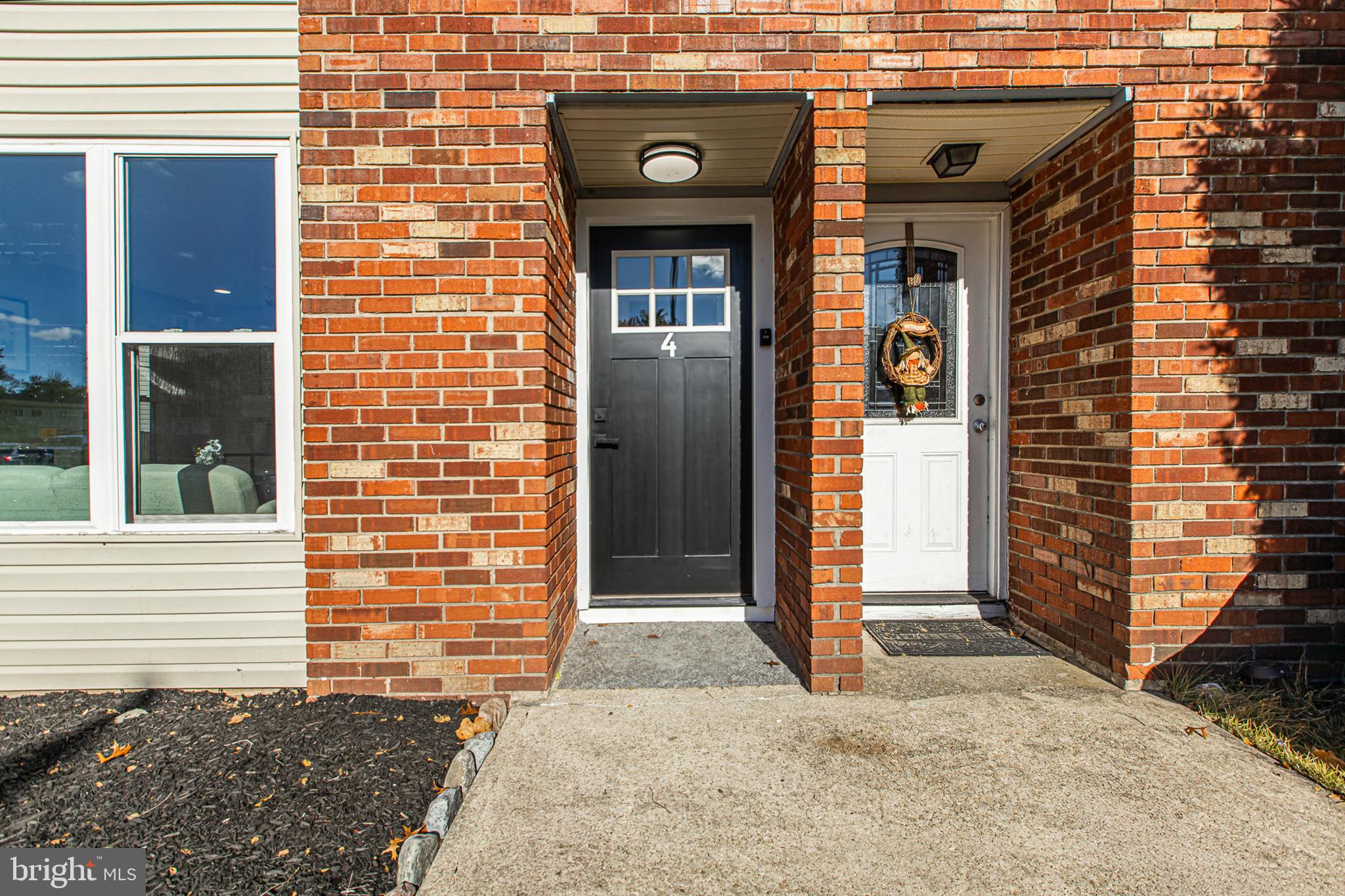 4 Corvas Court Sewell, NJ 08080 - Photo 5 of 40 a view of entrance of the house and window