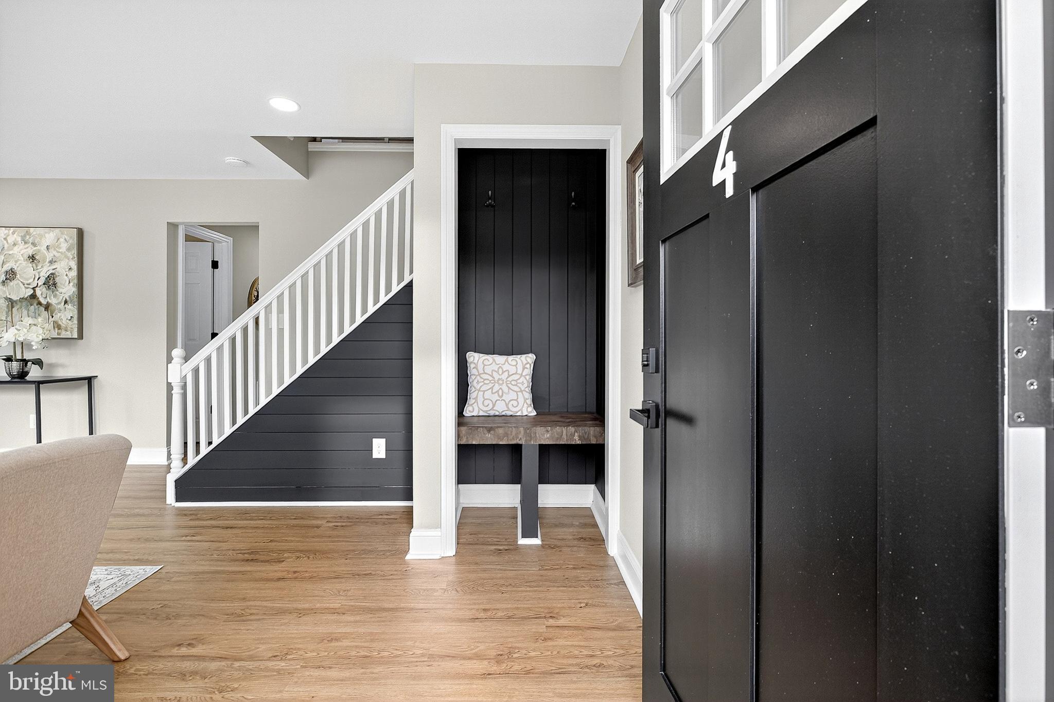 4 Corvas Court Sewell, NJ 08080 - Photo 6 of 40 a view of a hallway view with wooden floor and staircase