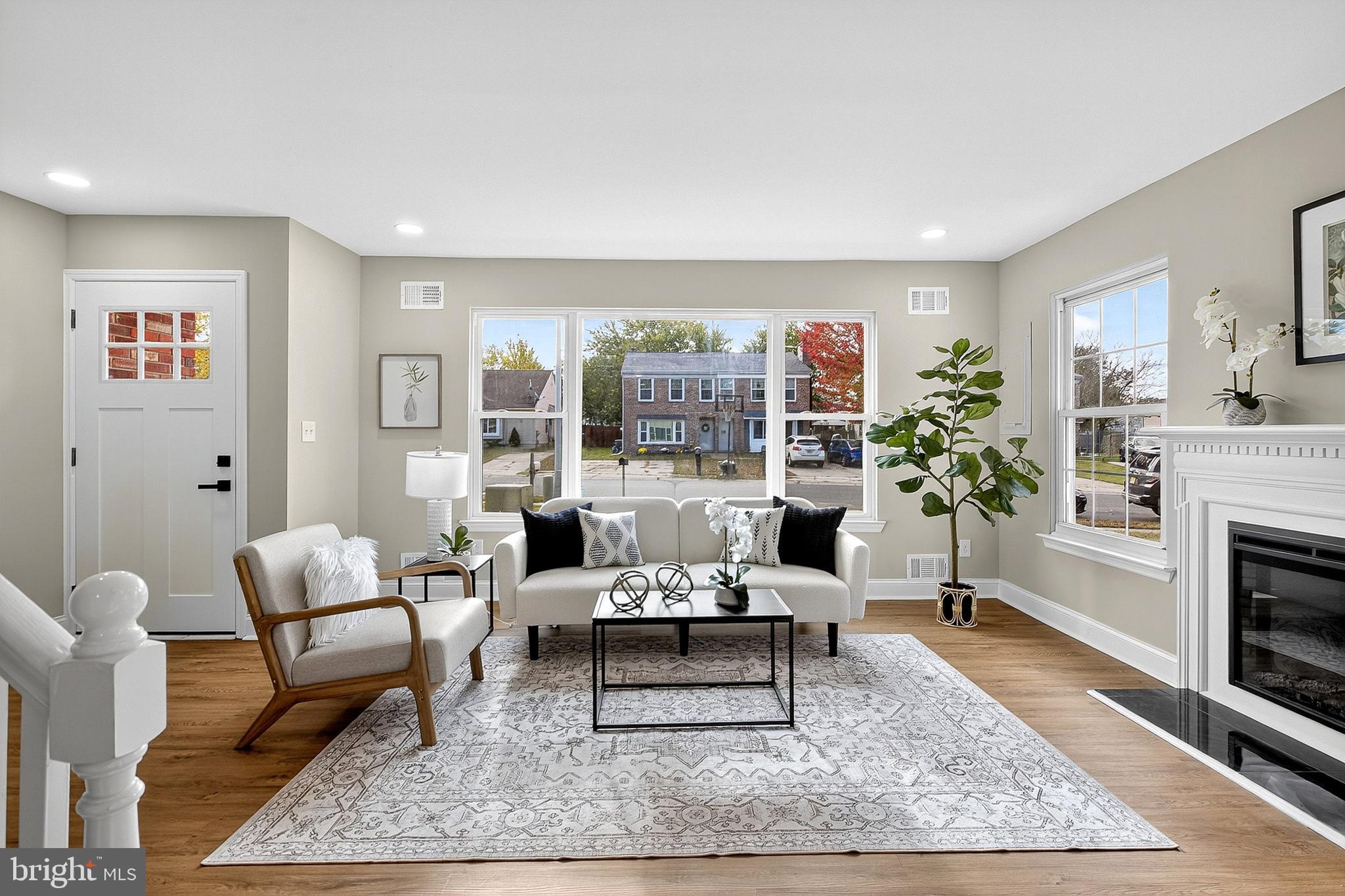 4 Corvas Court Sewell, NJ 08080 - Photo 9 of 40 a living room with furniture and a fireplace