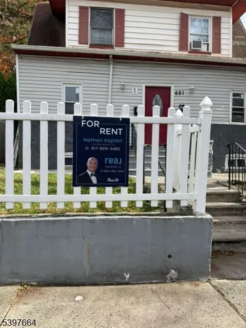 a front view of a building with glass windows