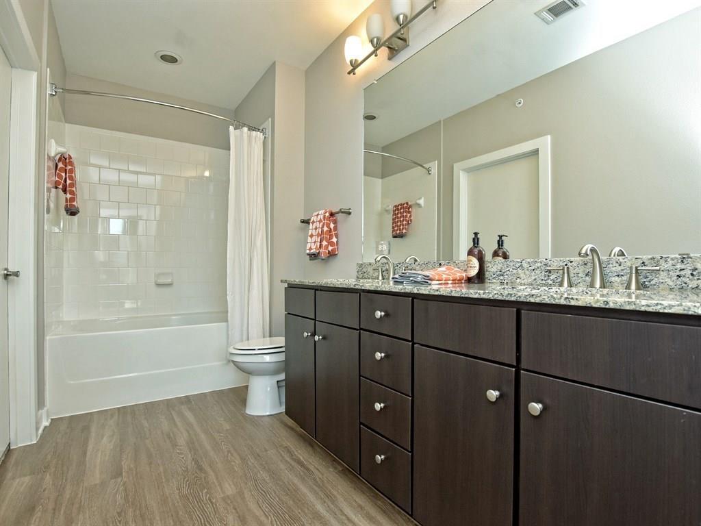 1900 Barton Springs Road, Unit 4017 Austin, TX 78704 - Photo 11 of 34 This image of the interior is representative and not of actual unit. Finishes including cabinetry, countertops, backsplash and flooring are the same. Unit 4017 is mirrored of this representative unit.