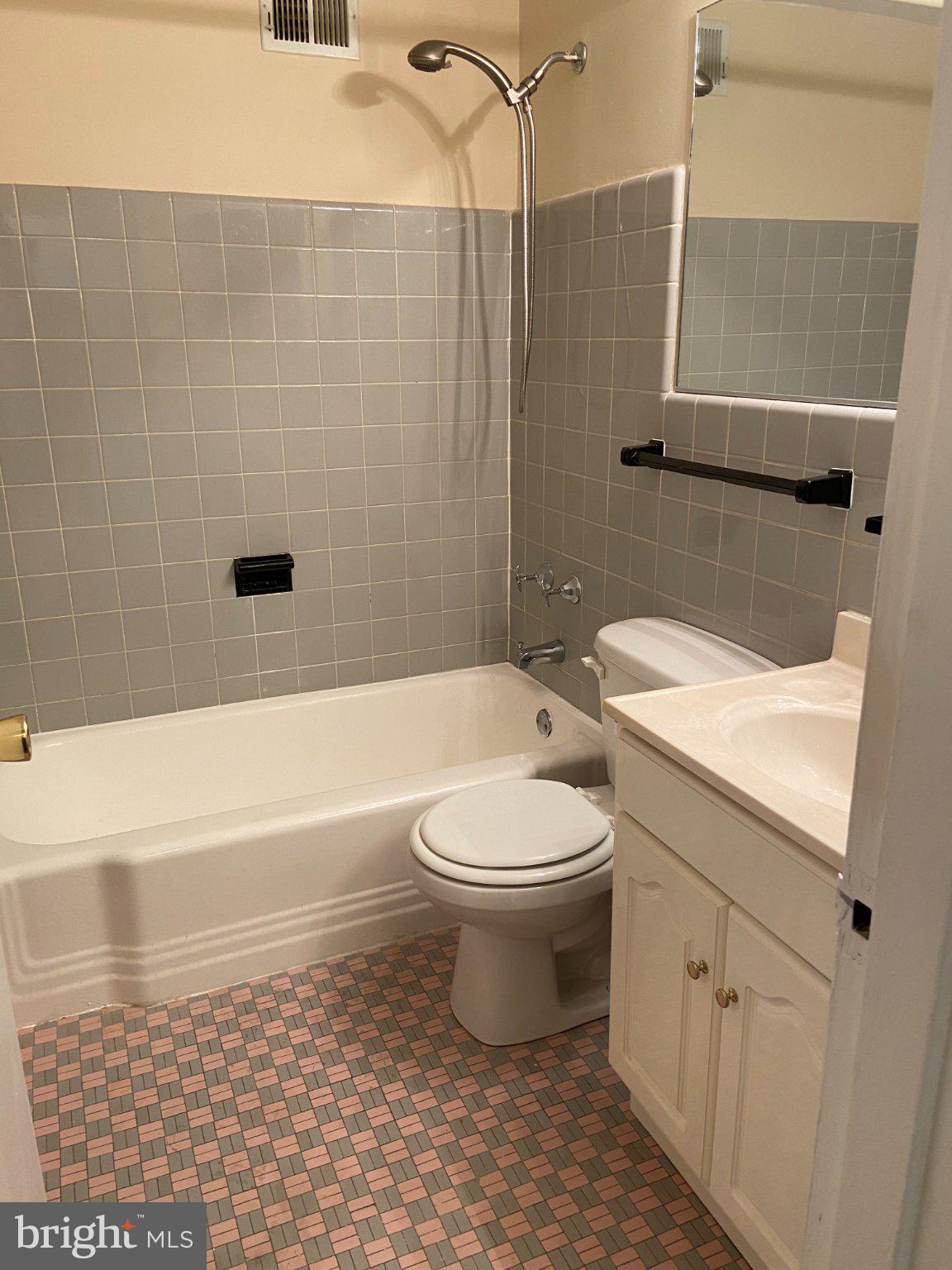 2101 Chestnut Street, Unit 706 Philadelphia, PA 19103 - Photo 2 of 9 Charming bathroom with vintage tiles.