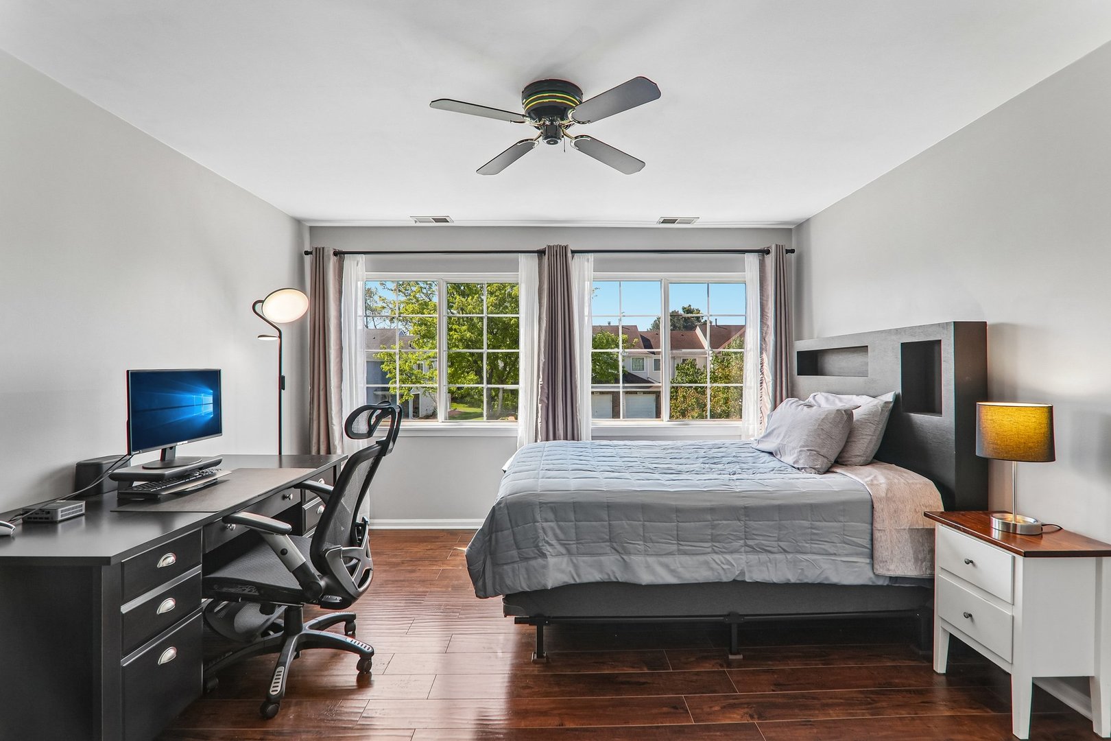 1064 Ripple Ridge Darien, IL 60561 - Photo 12 of 16 a bedroom with furniture and a window