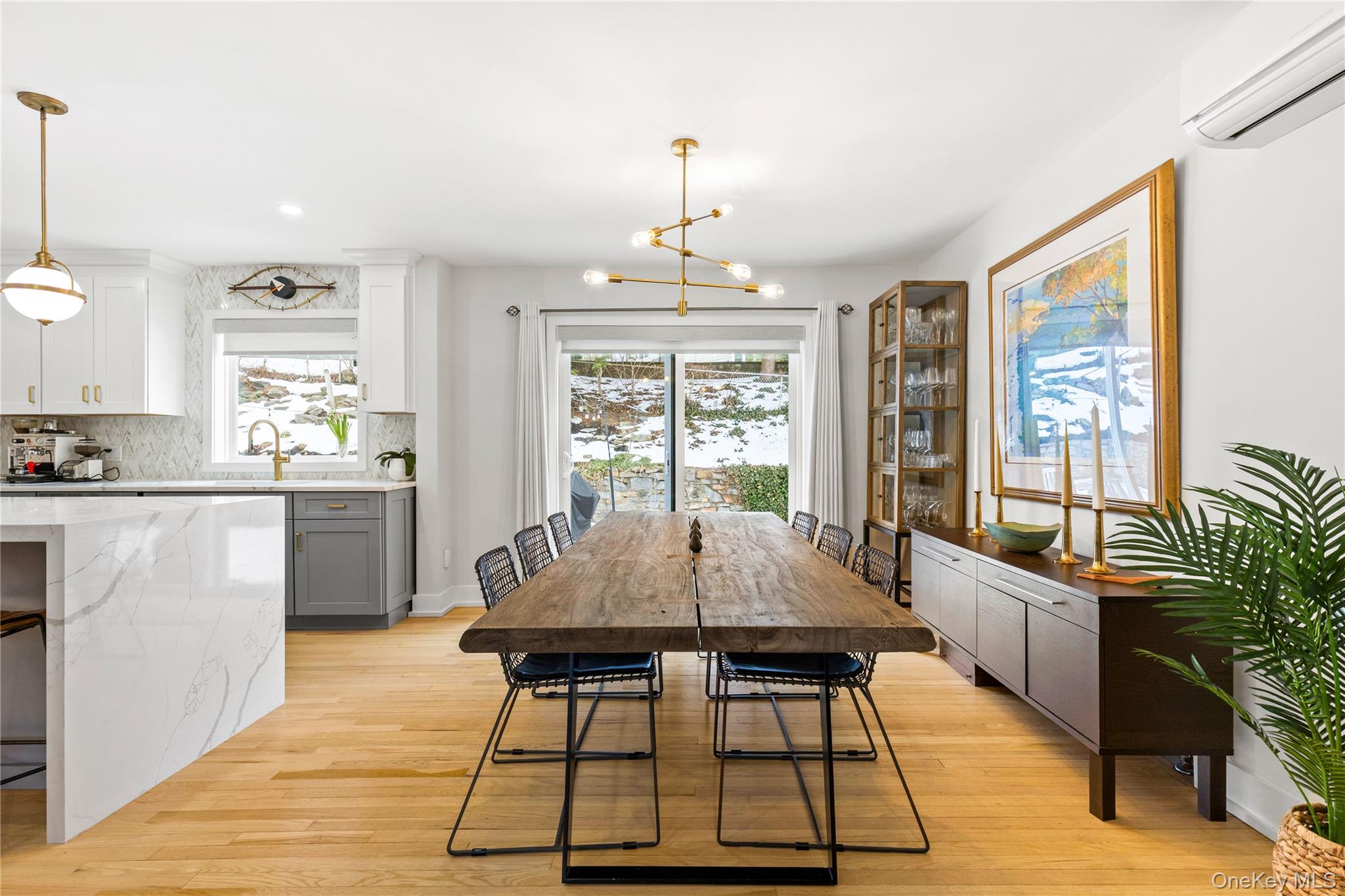 24 Old Well Road Purchase, NY 10577 - Photo 11 of 37 a view of a dining room with furniture window and wooden floor