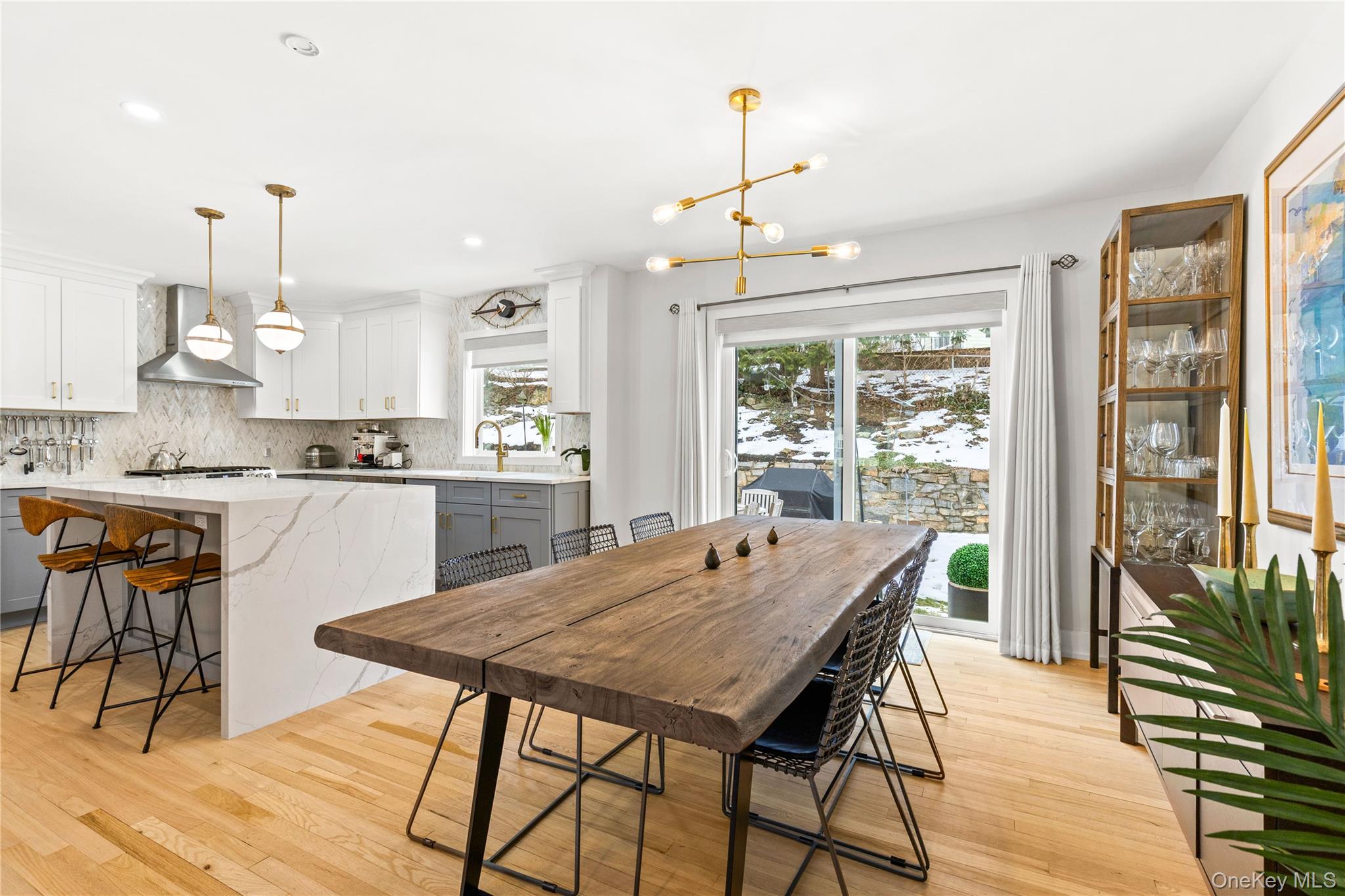 24 Old Well Road Purchase, NY 10577 - Photo 12 of 37 a view of a dining room with furniture window and wooden floor