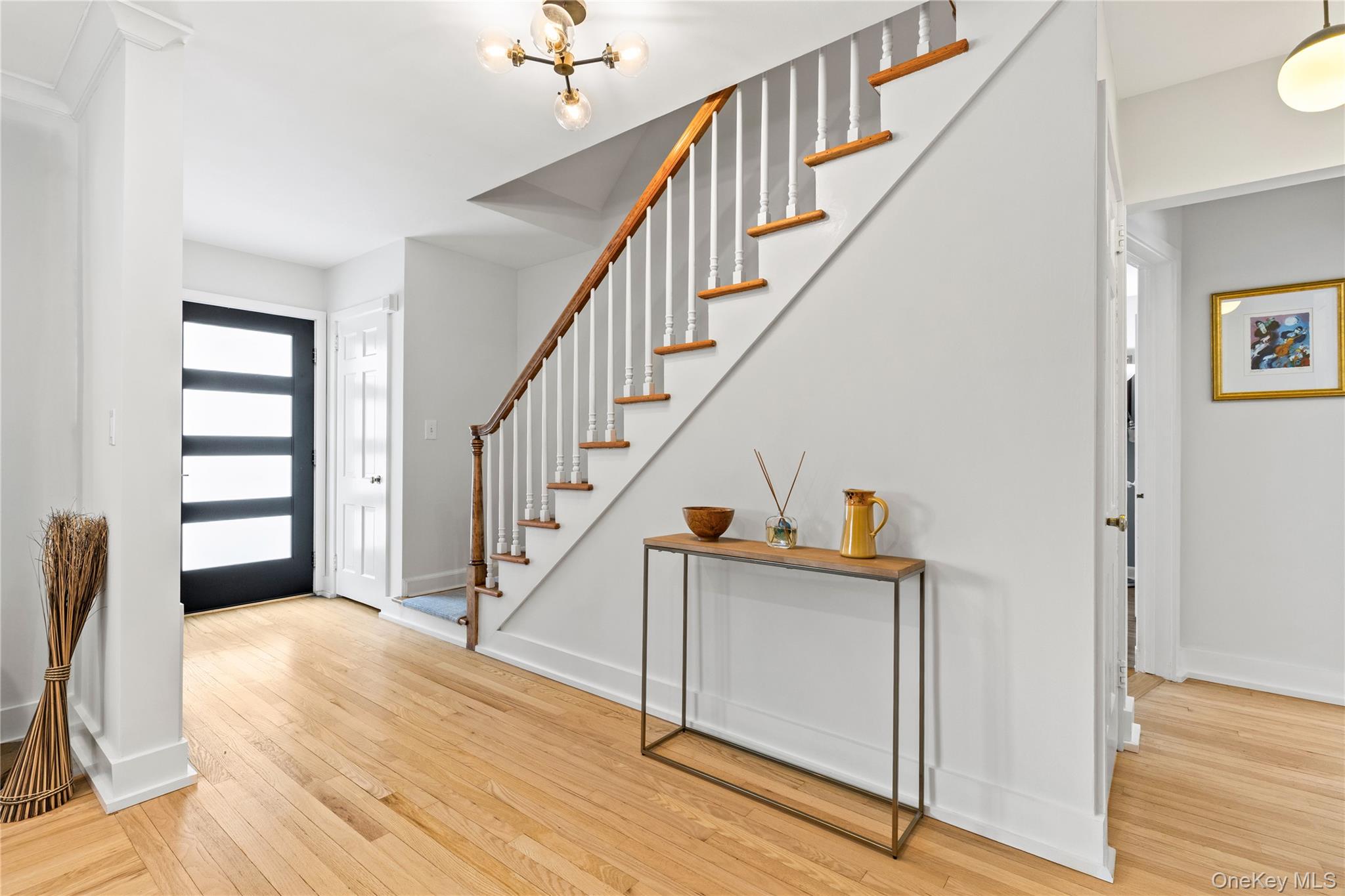 24 Old Well Road Purchase, NY 10577 - Photo 14 of 37 a view of entryway and hall with wooden floor