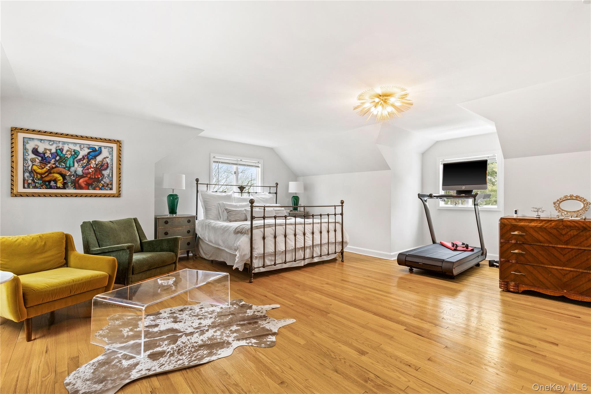 24 Old Well Road Purchase, NY 10577 - Photo 15 of 37 a bedroom with furniture and a wooden floor