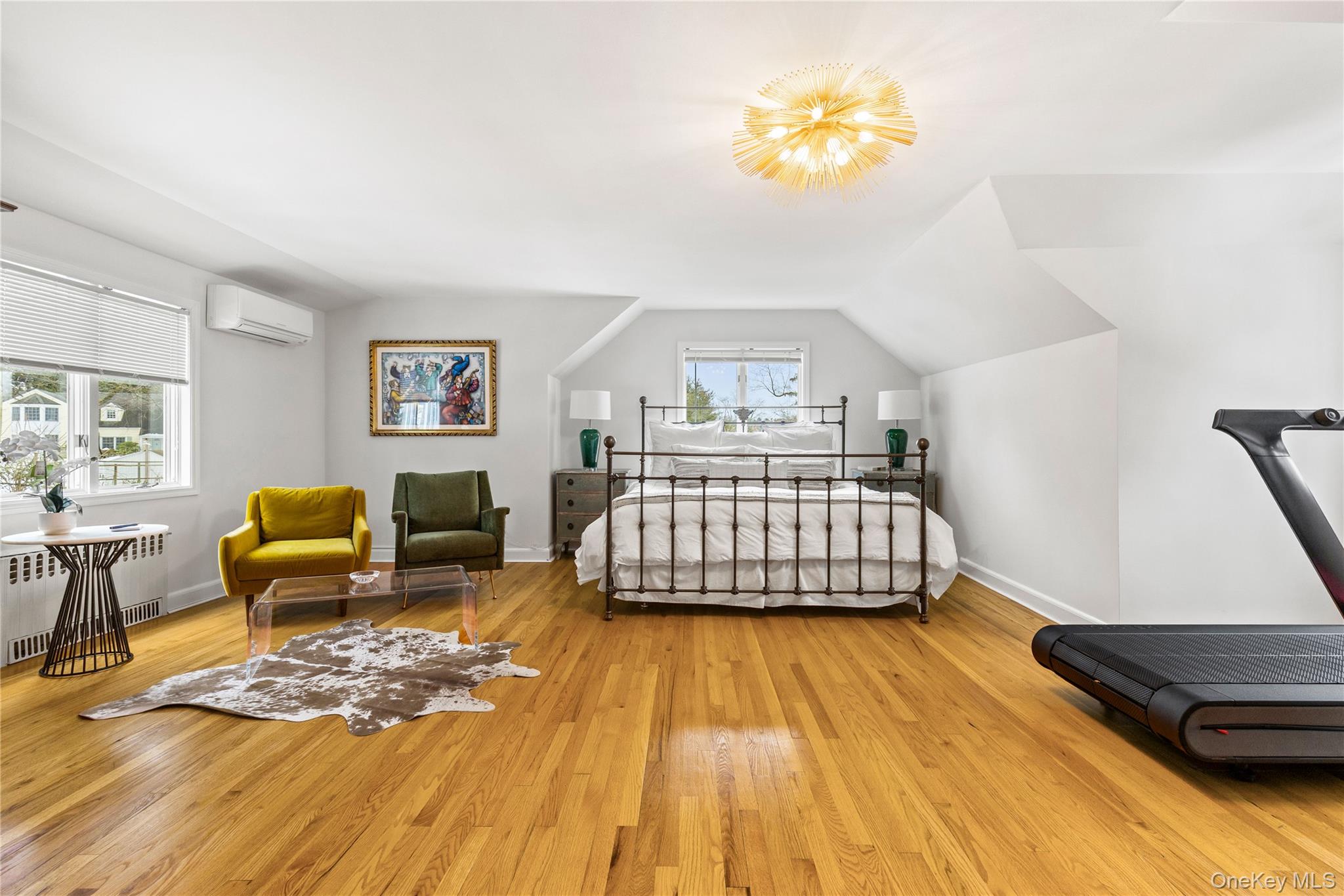 24 Old Well Road Purchase, NY 10577 - Photo 16 of 37 a bedroom with a bed and a couch