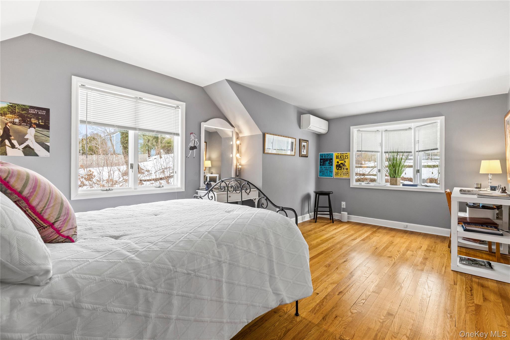 24 Old Well Road Purchase, NY 10577 - Photo 17 of 37 a spacious bedroom with a large bed and a large window