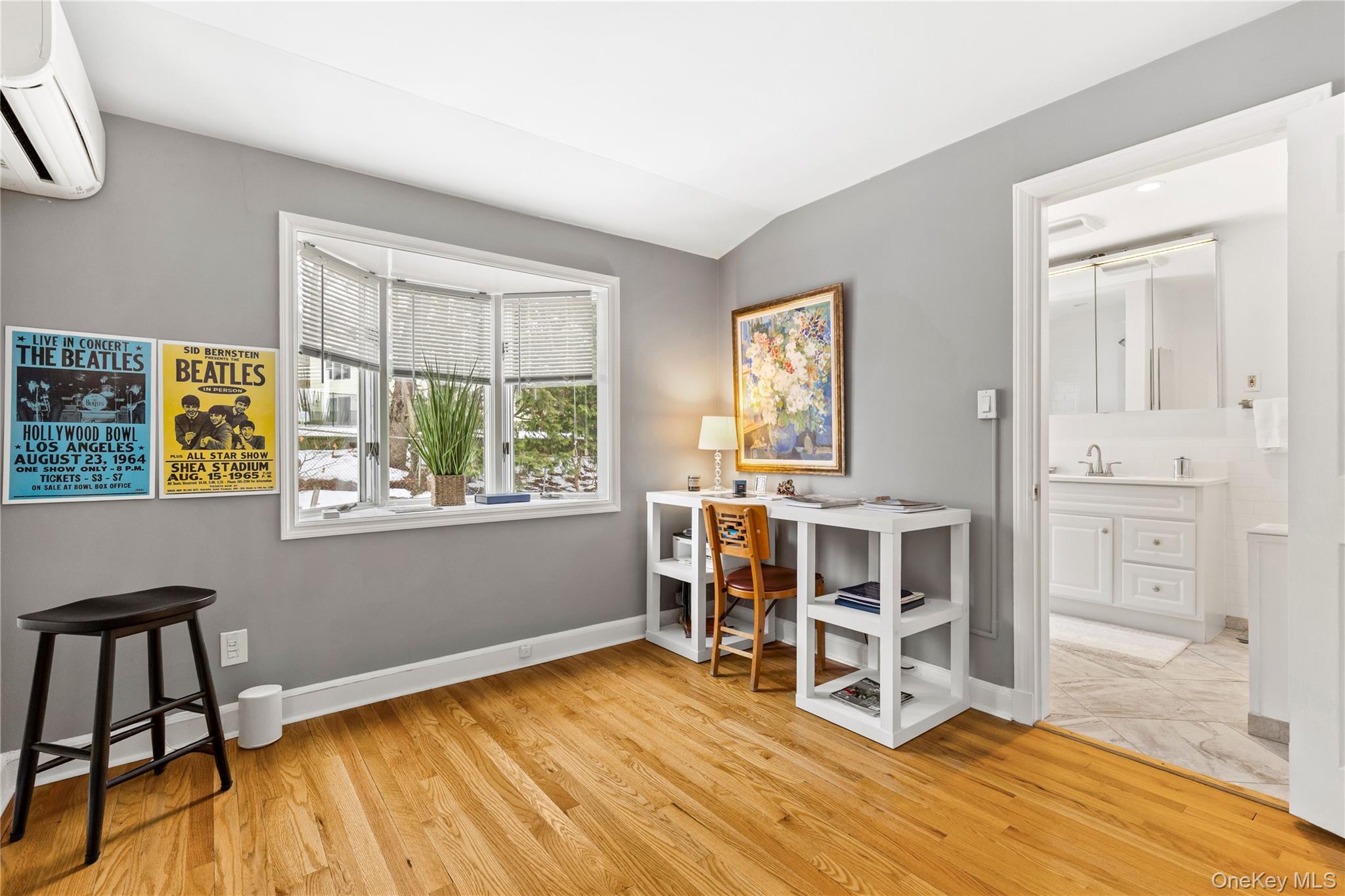 24 Old Well Road Purchase, NY 10577 - Photo 18 of 37 a view of a workspace with furniture and a window