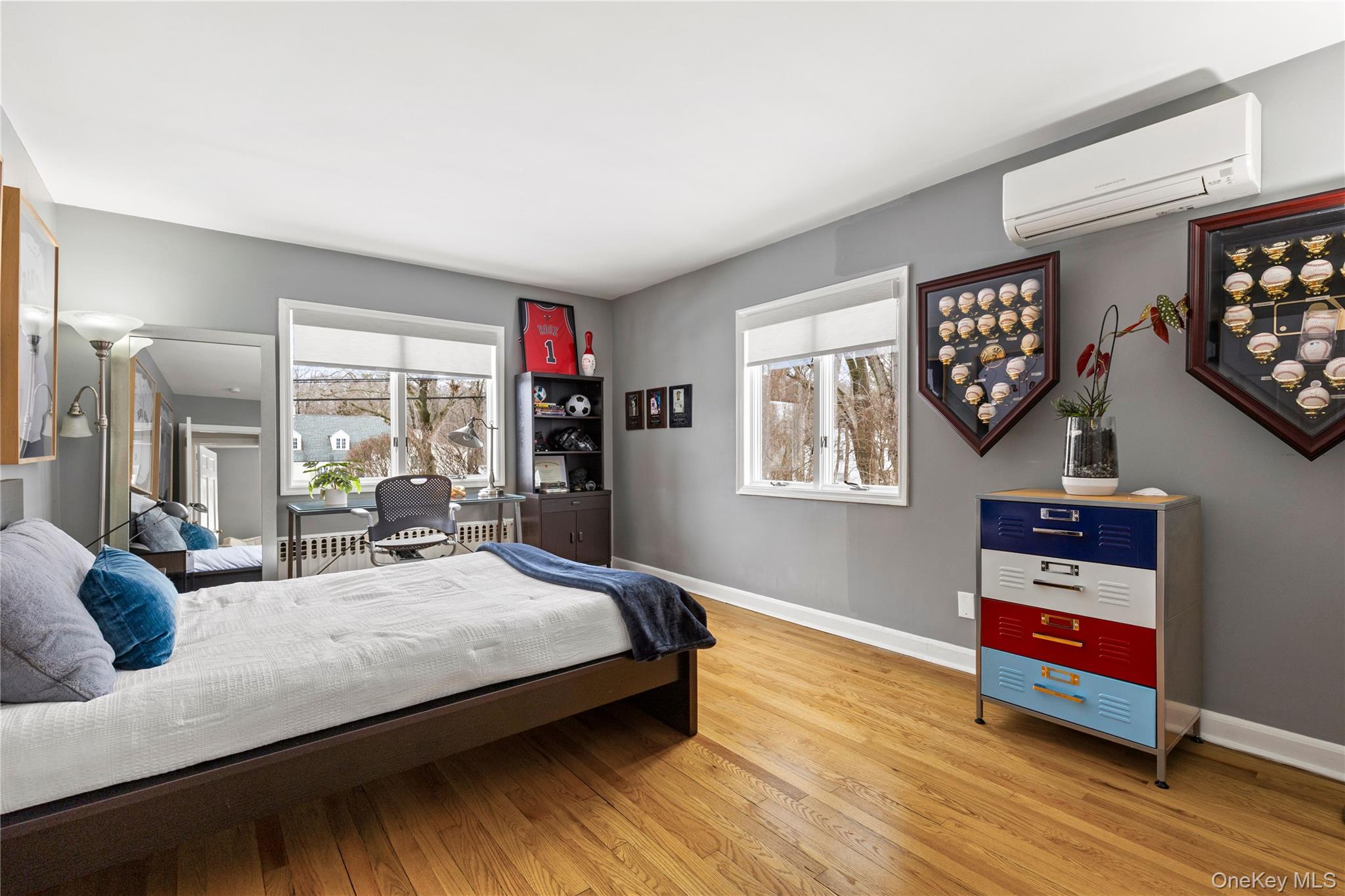 24 Old Well Road Purchase, NY 10577 - Photo 20 of 37 a bedroom with bed and window