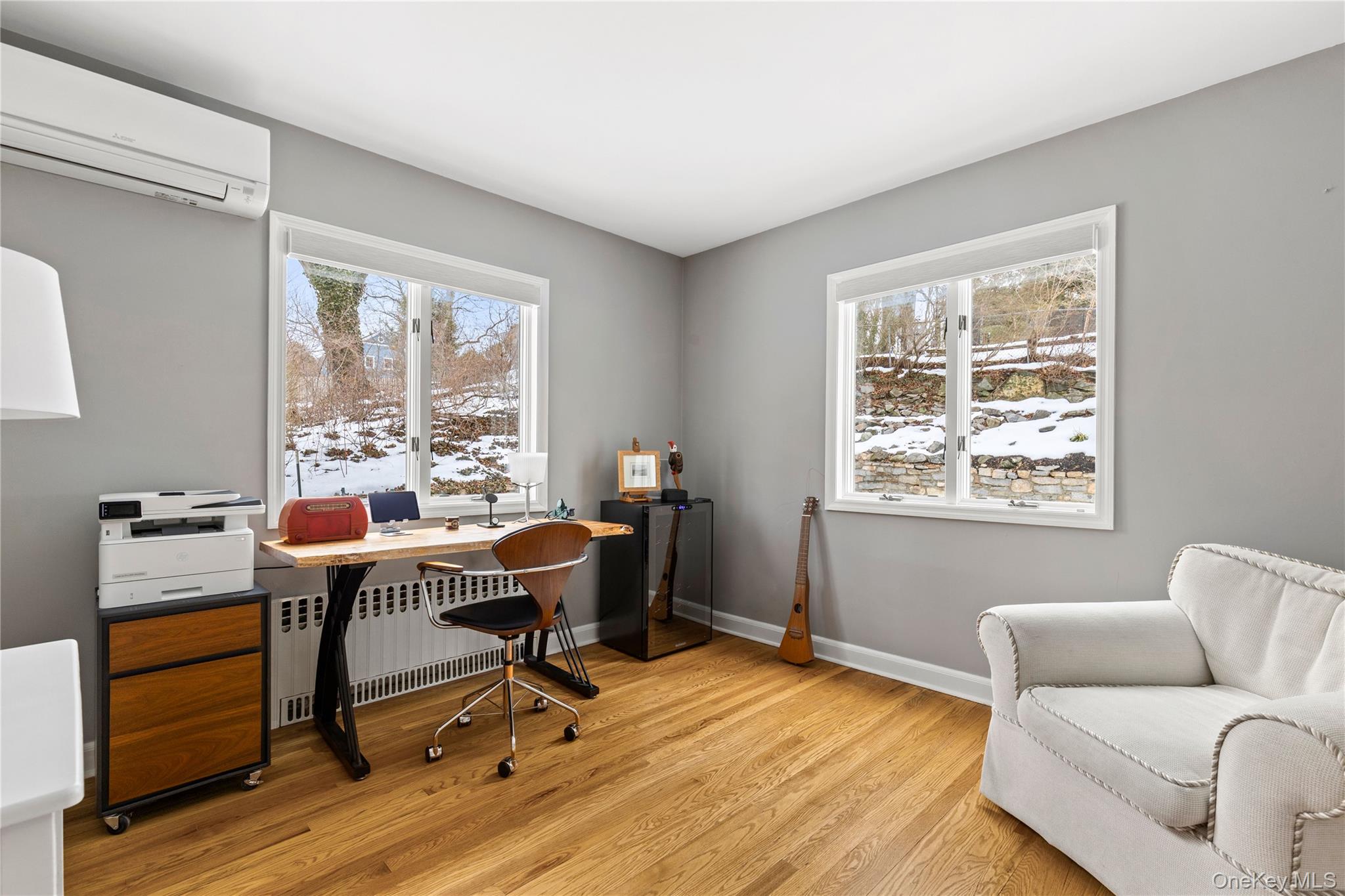 24 Old Well Road Purchase, NY 10577 - Photo 21 of 37 a work room with furniture wooden floor and windows