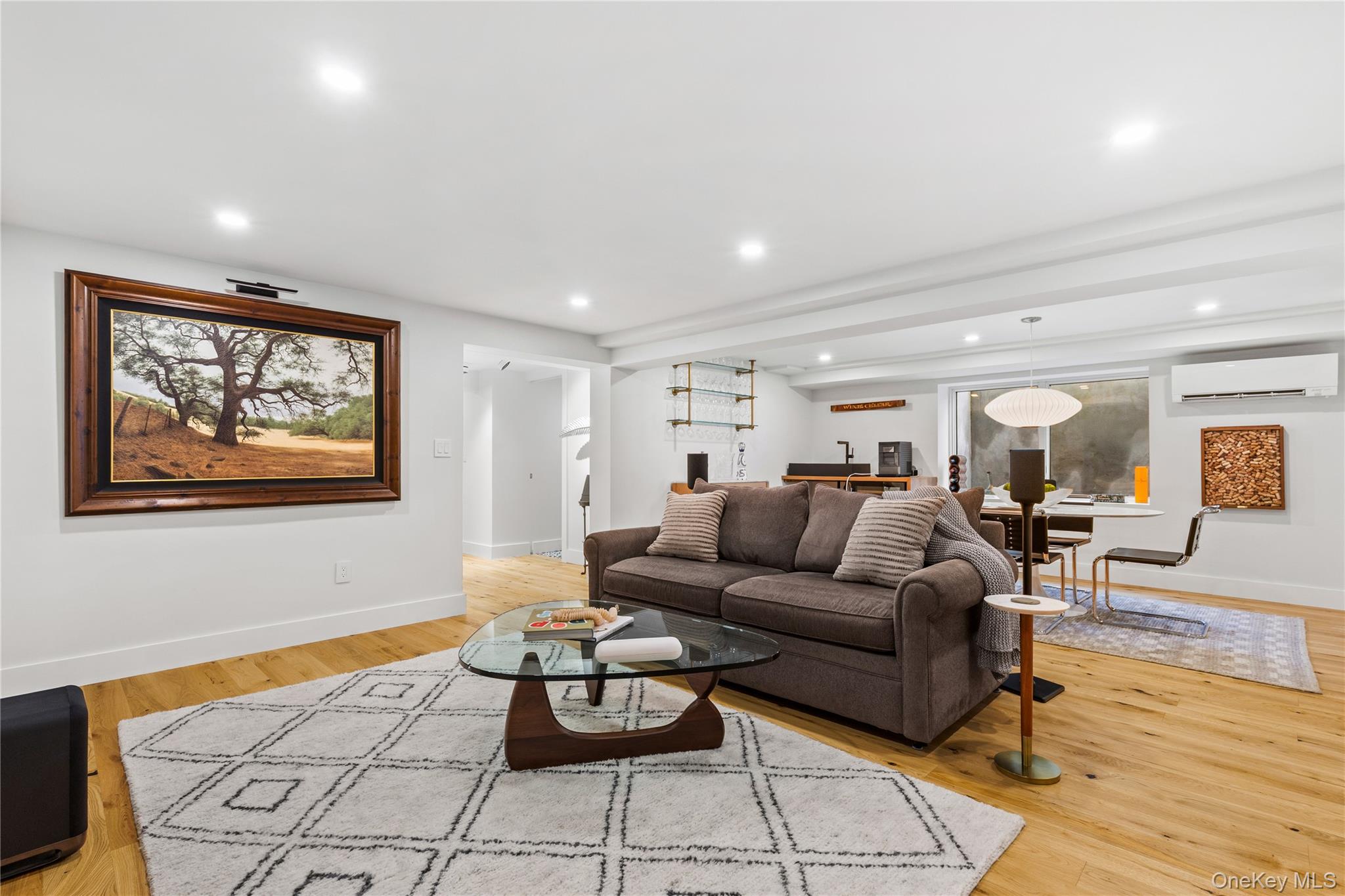 24 Old Well Road Purchase, NY 10577 - Photo 24 of 37 a living room with furniture and wooden floor