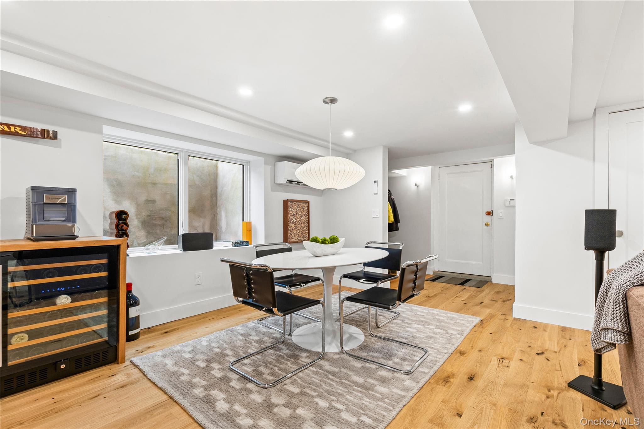 24 Old Well Road Purchase, NY 10577 - Photo 26 of 37 a living room with furniture a rug and a table