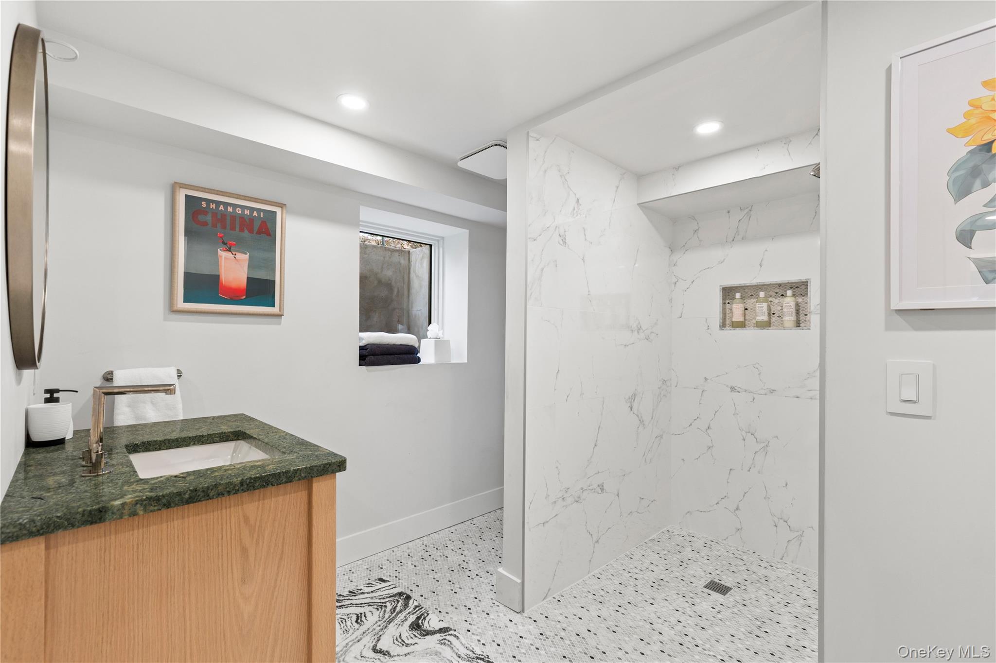 24 Old Well Road Purchase, NY 10577 - Photo 30 of 37 a bathroom with a granite countertop sink a mirror and shower