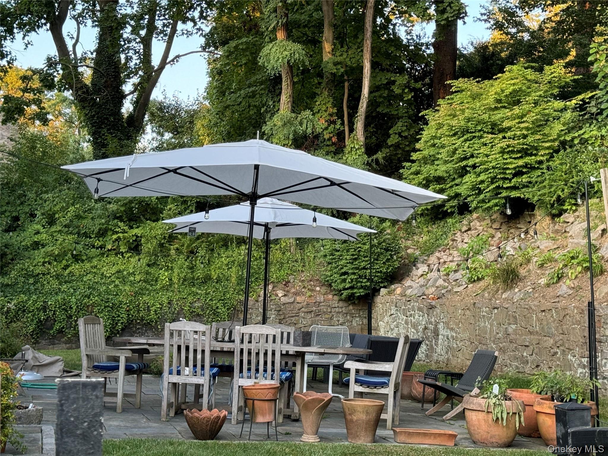 24 Old Well Road Purchase, NY 10577 - Photo 37 of 37 a view of house with furniture and backyard