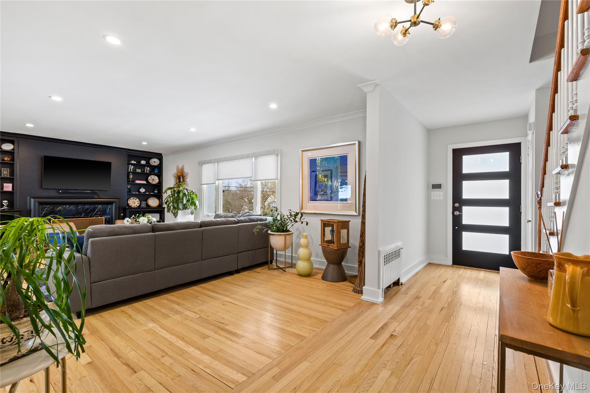 24 Old Well Road Purchase, NY 10577 - Photo 5 of 37 a living room with furniture and a flat screen tv