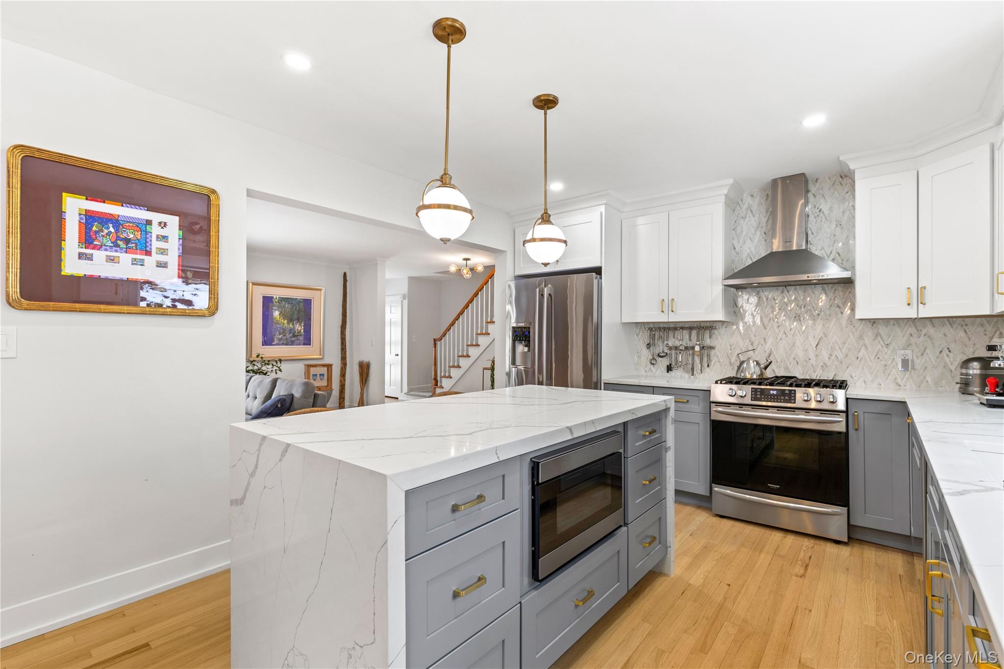 24 Old Well Road Purchase, NY 10577 - Photo 9 of 37 a kitchen with a stove and a wooden floor