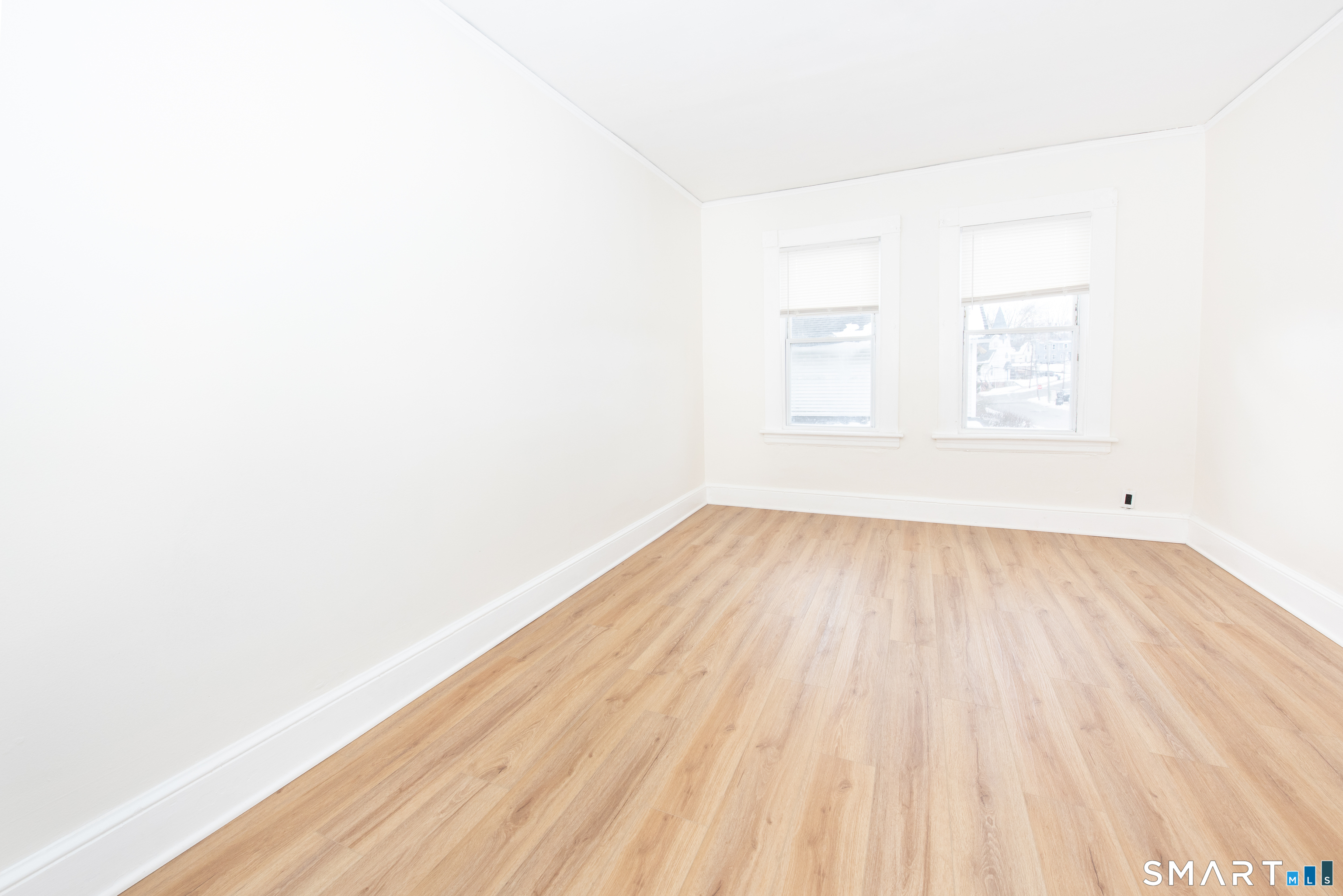 110 Beaver Street Ansonia, CT 06401 - Photo 8 of 30 a view of a room that has wooden floor and a window