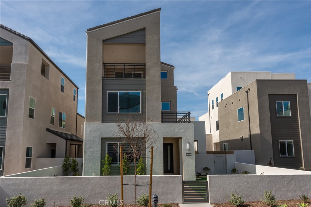 a front view of a building with large windows