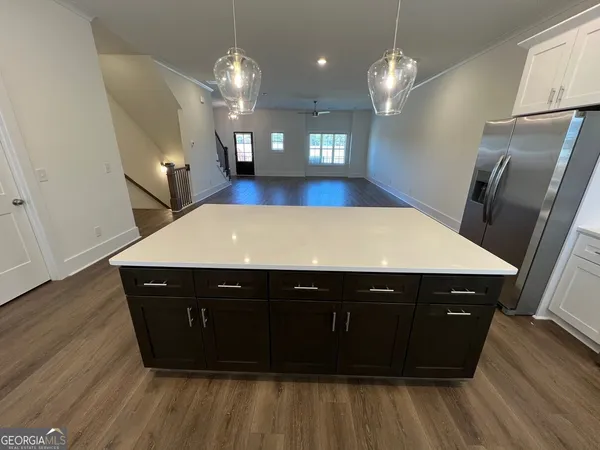 a view of furniture and wooden floor