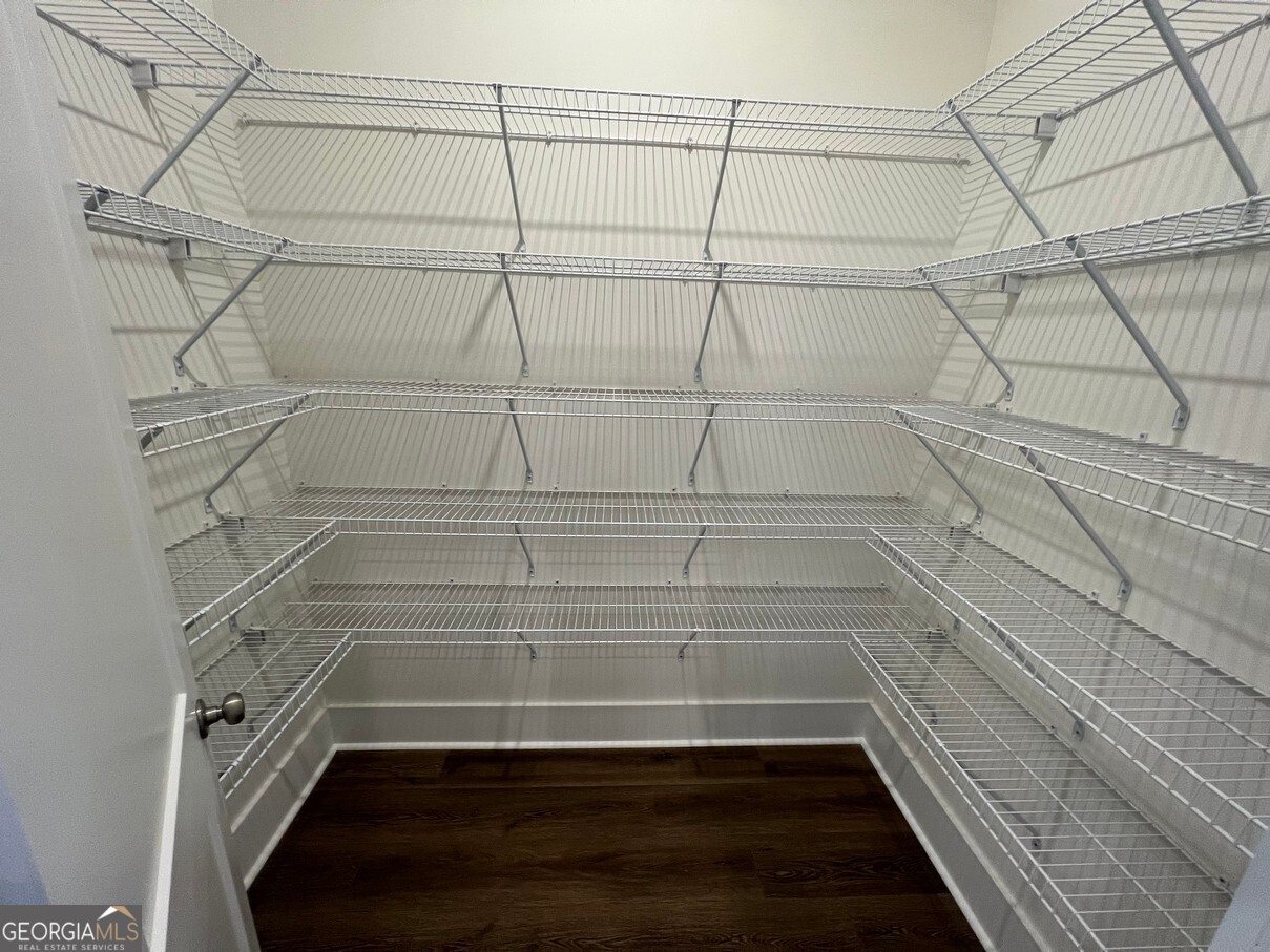 899 Duck Walk Way Lawrenceville, GA 30046 - Photo 14 of 49 a view of a room with empty racks