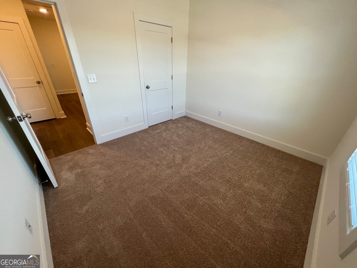899 Duck Walk Way Lawrenceville, GA 30046 - Photo 35 of 49 a view of an empty room