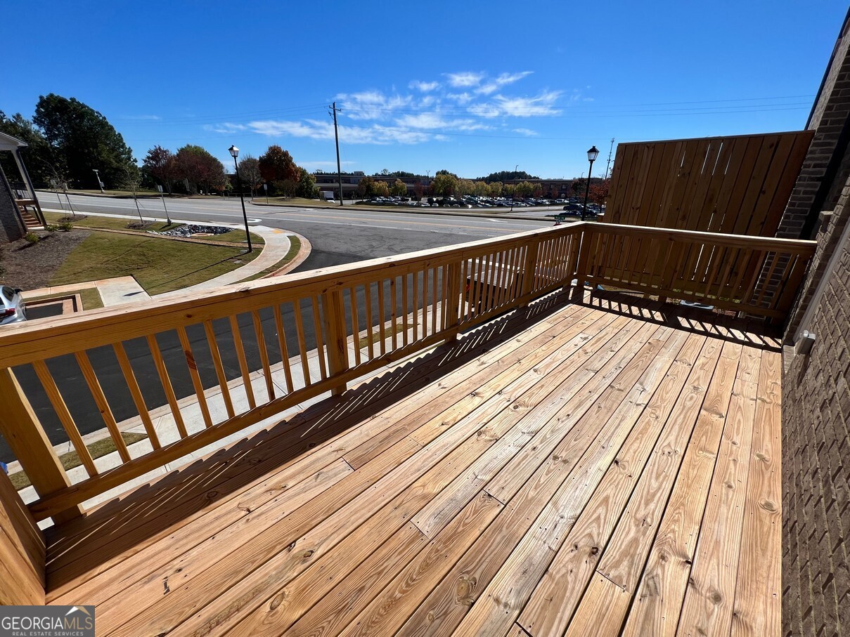 899 Duck Walk Way Lawrenceville, GA 30046 - Photo 48 of 49 a view of balcony with wooden floor and outdoor space